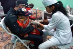Tiêm phòng viêm não Nhật Bản tại Trạm Y tế phường Nguyễn Thị Minh Khai, thị xã Bắc Kạn